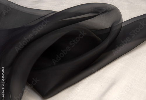 Twisted twirl of organza fabric brown texture