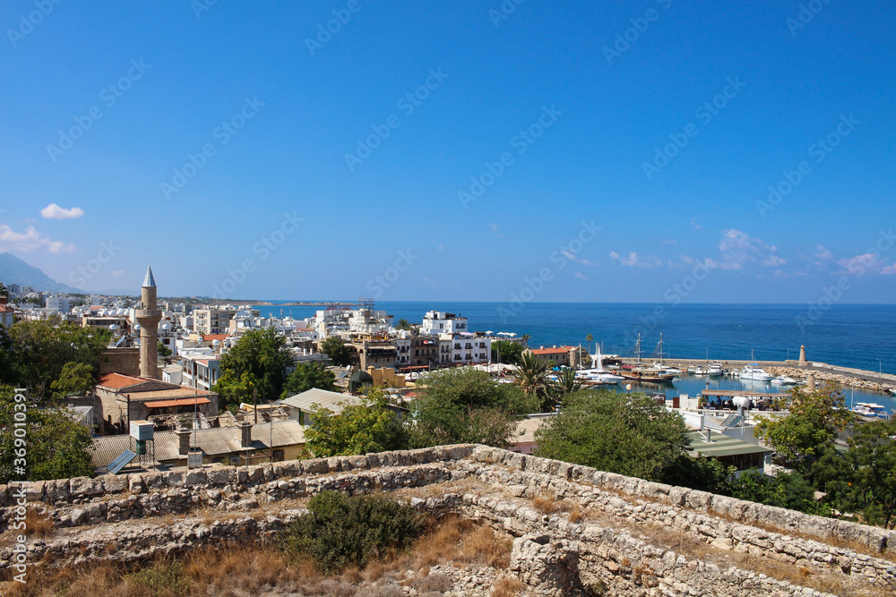 View from the fortress of Kyrenia on the Bay, mosque with minaret, houses and the sea. Kyrenia. Cyprus...