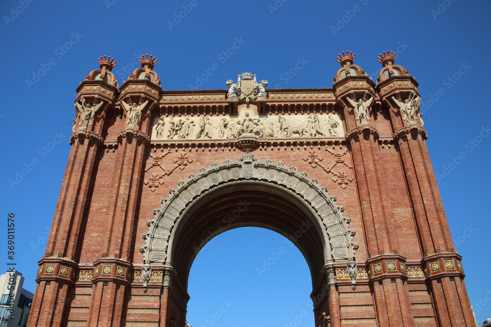 The triumphal Arch of Barcelona on the background of bright blue sky in Barcelona. Catalonia, Spain.