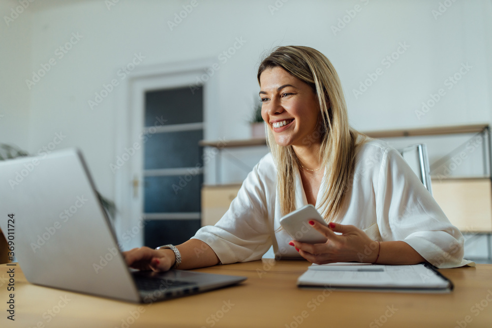 Beautiful happy woman using laptop, portrait. Beautiful happy woman using laptop, portrait.