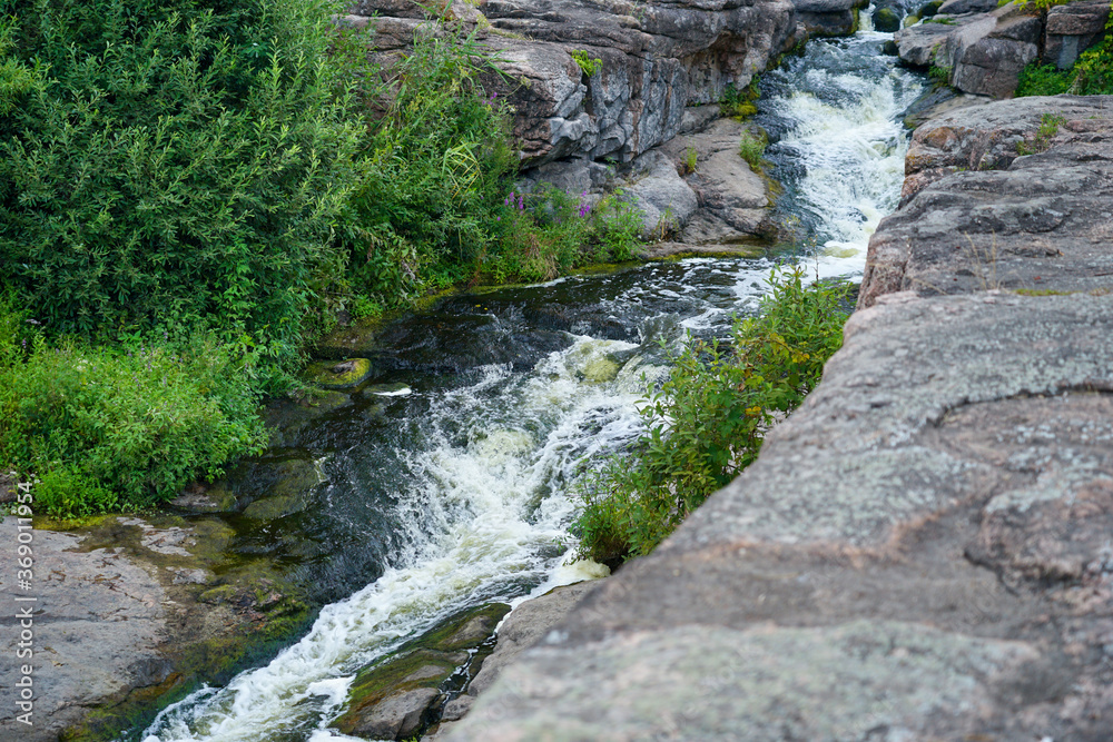 mountain stream waterfall and green moss on the stone mountain stream waterfall and green moss on the stone