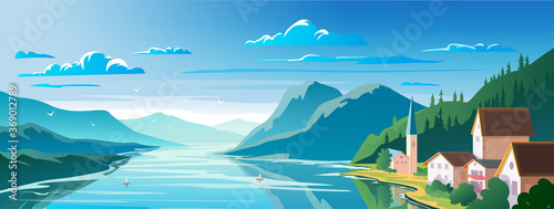 Beautiful scenery, mountain lake and a houses on the shore Panoramic view