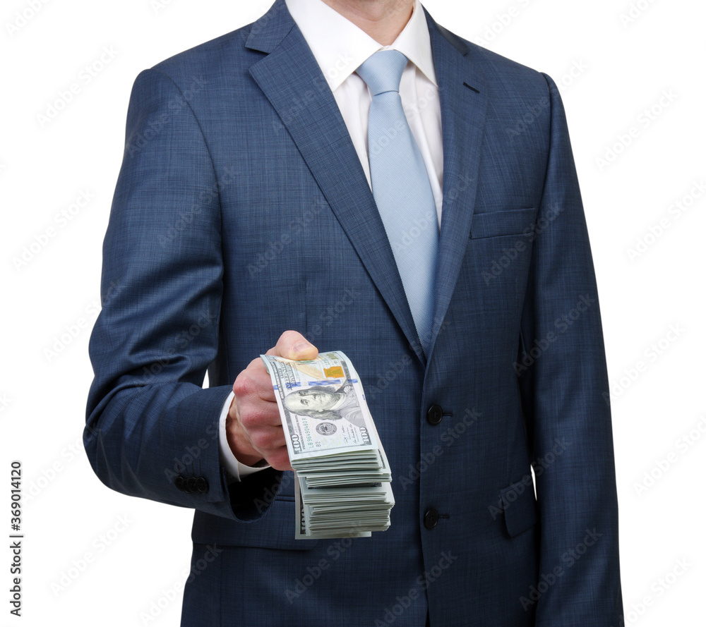 Money in a hand of the businessman isolated on white Money in a hand of the businessman isolated on white
