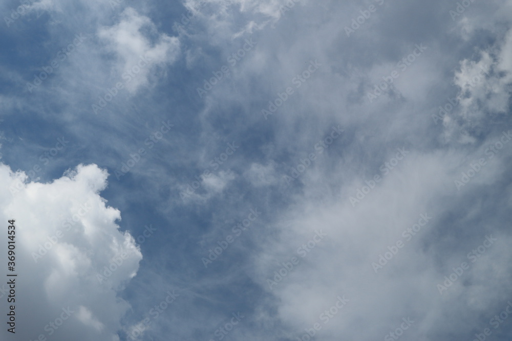 White clouds against blue sky background