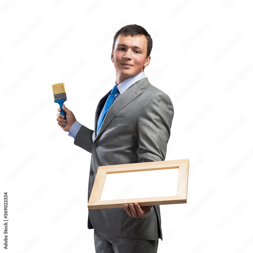 Creative businessman painter holding paintbrush Creative businessman painter holding paintbrush
