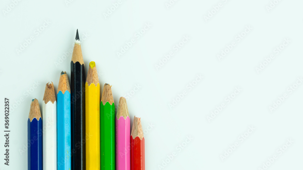 Colourful pencils are kept but only one pencil are clearly can be used to represent performance and leadership concept Colourful pencils are kept but only one pencil are clearly can be used to represent performance and leadership concept