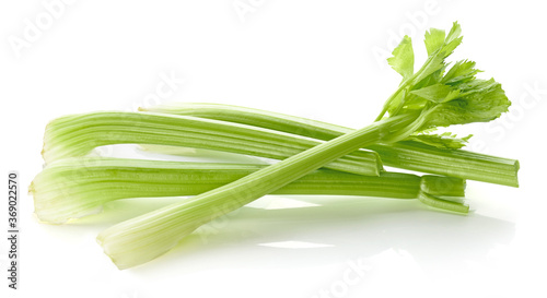 Fresh celery sticks isolated on white background