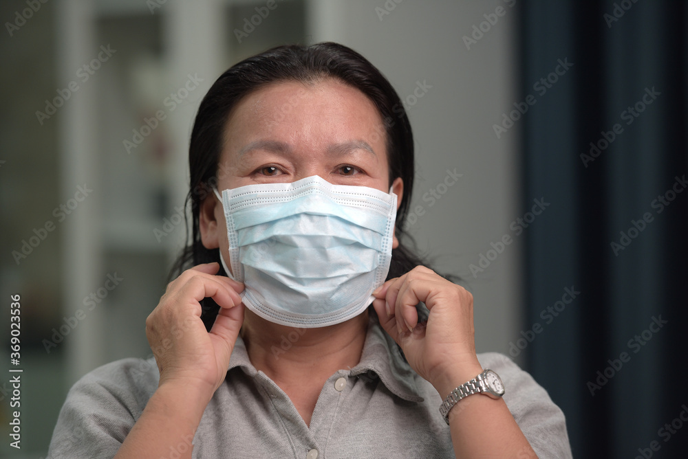 White woman with a disposable face mask Protection against viruses and infections White woman with a disposable face mask Protection against viruses and infections