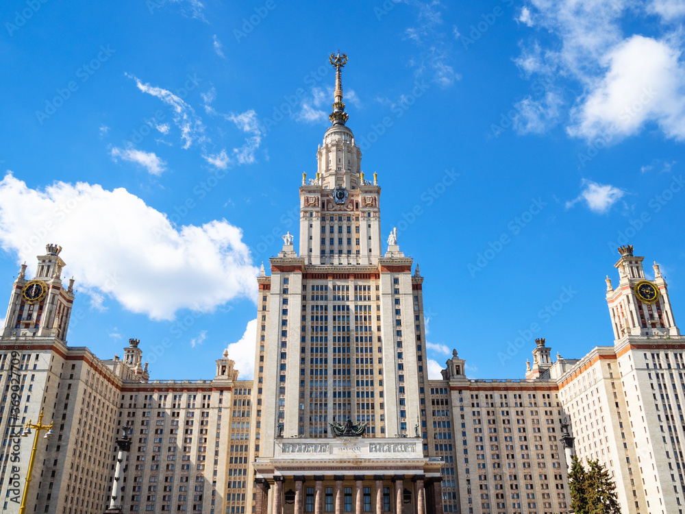 front view of north facade of The Main Building of Moscow University. The inscription above the portal: 1949-1953 Moscow State University named after MV Lomonosov front view of north facade of The Main Building of Moscow University. The inscription above the portal: 1949-1953 Moscow State University named after MV Lomonosov