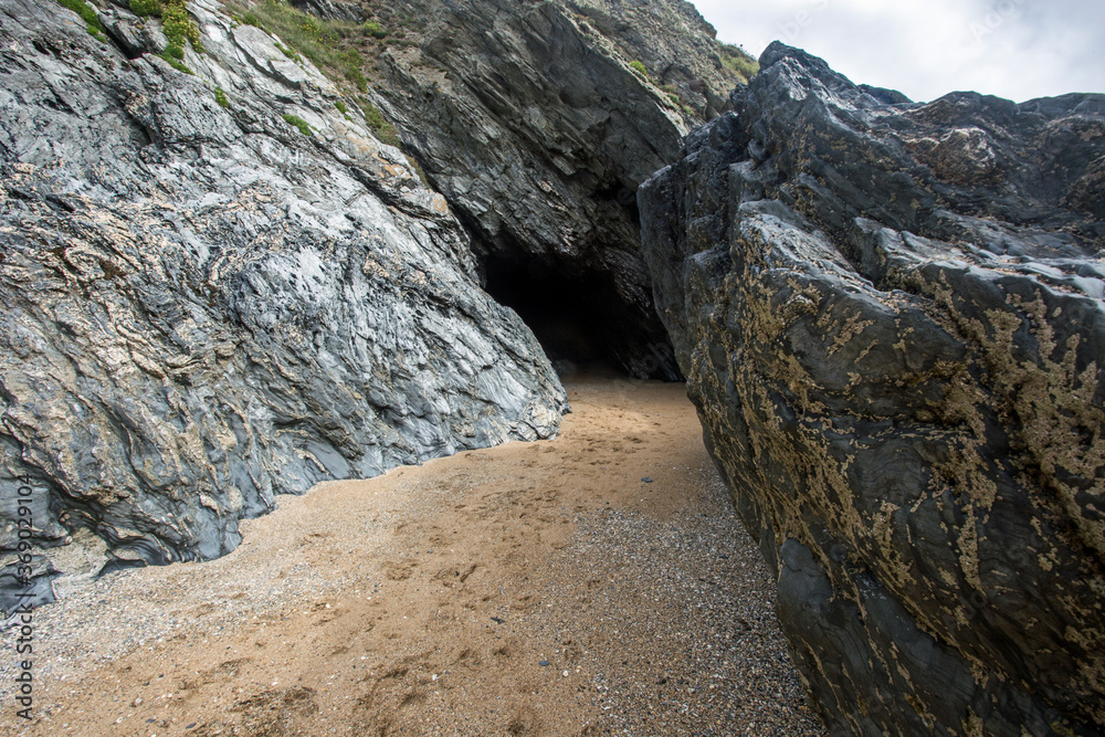 Caves on the beach at Polly Joke, Cornwall, England