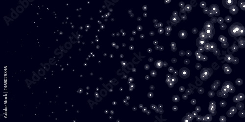 Isolated pattern. Stars increasing in size from one side to another. Black background.