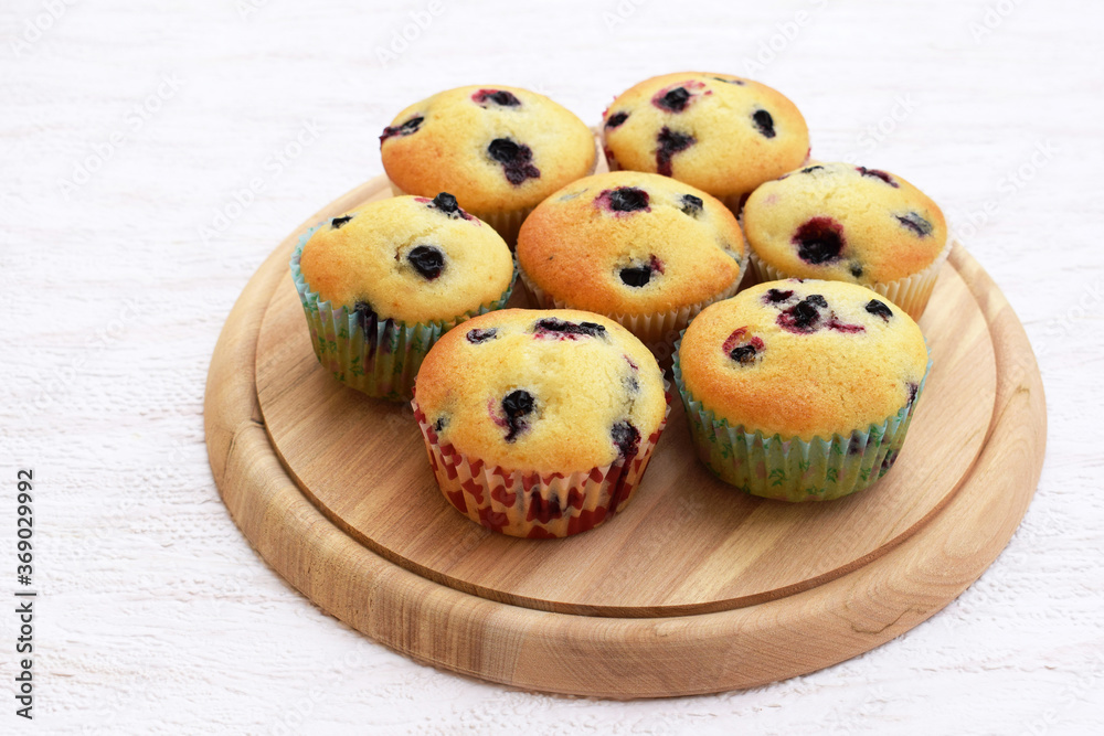 Summer baking - delicious homemade muffins with black currant