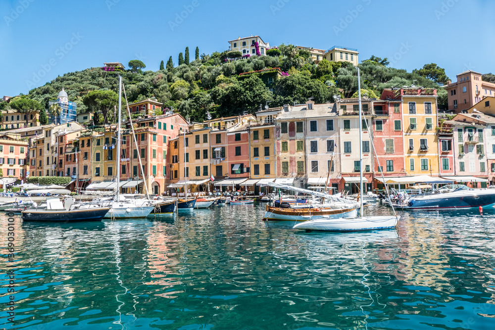 the bay of Portofino with colorful facede and many boats