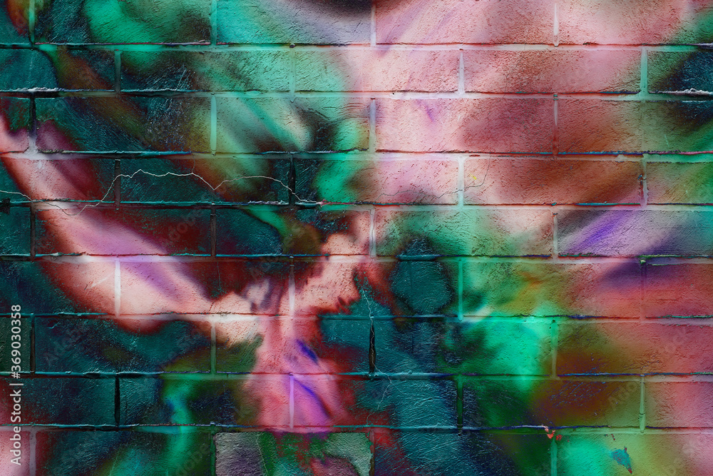 Brick wall. Abstract beautiful street art colorful graffiti style closeup. Iconic urban culture youth