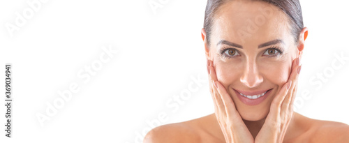 Beautiful portrait of young adult woman with clean skin without make-up. Spa skincare wellness and cosmetics concept