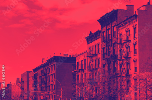 Block of old buildings in the East Village neighborhood of New York City with red and blue duotone color effect photo
