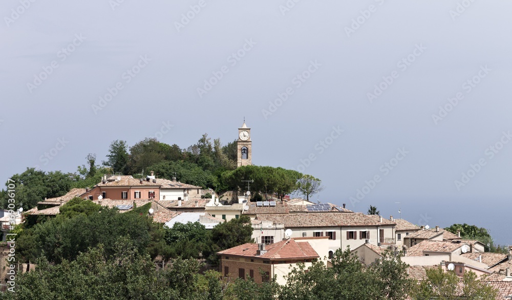 Panoramic view of 'Fiorenzuola di Focara', a small italian town in 'San Bartolo National Park' above Mediterranean sea (Pesaro, Marche, Italy, Europe)
