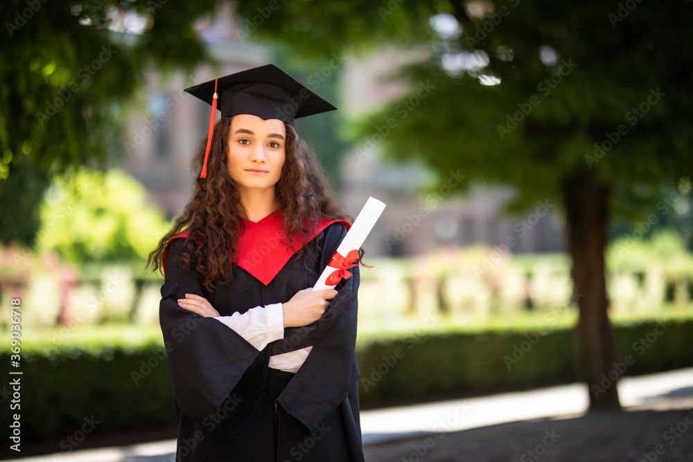 Young woman portrait on her graduation day. University. Education, graduation and people concept. Young woman portrait on her graduation day. University. Education, graduation and people concept.