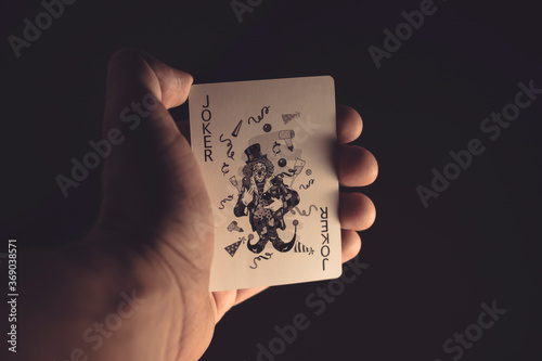 playing cards in hand