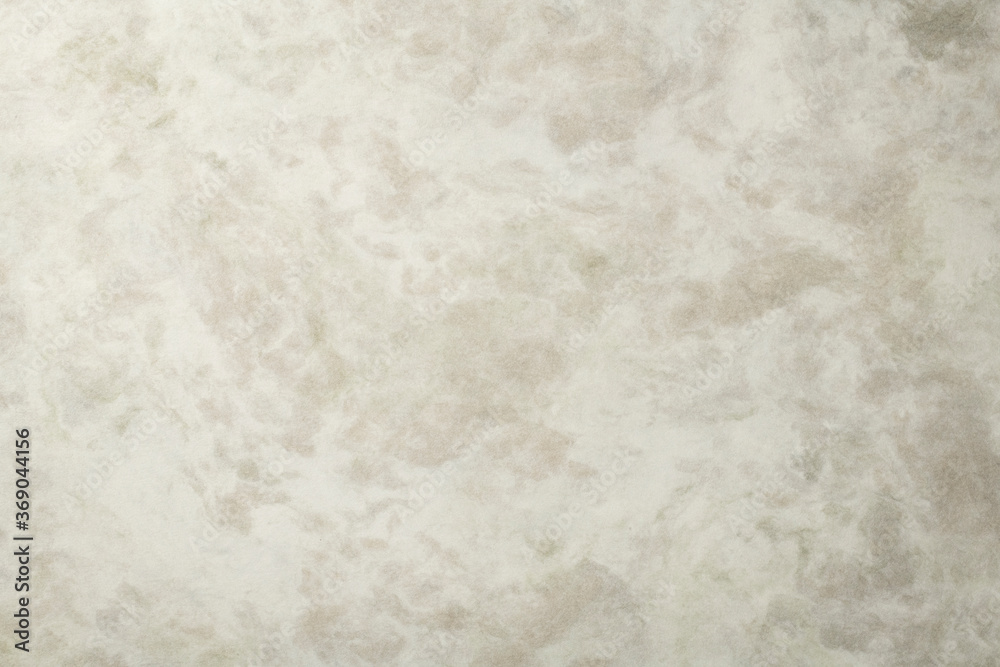 Obraz premium ベージュのマーブル調の紙の背景テクスチャー