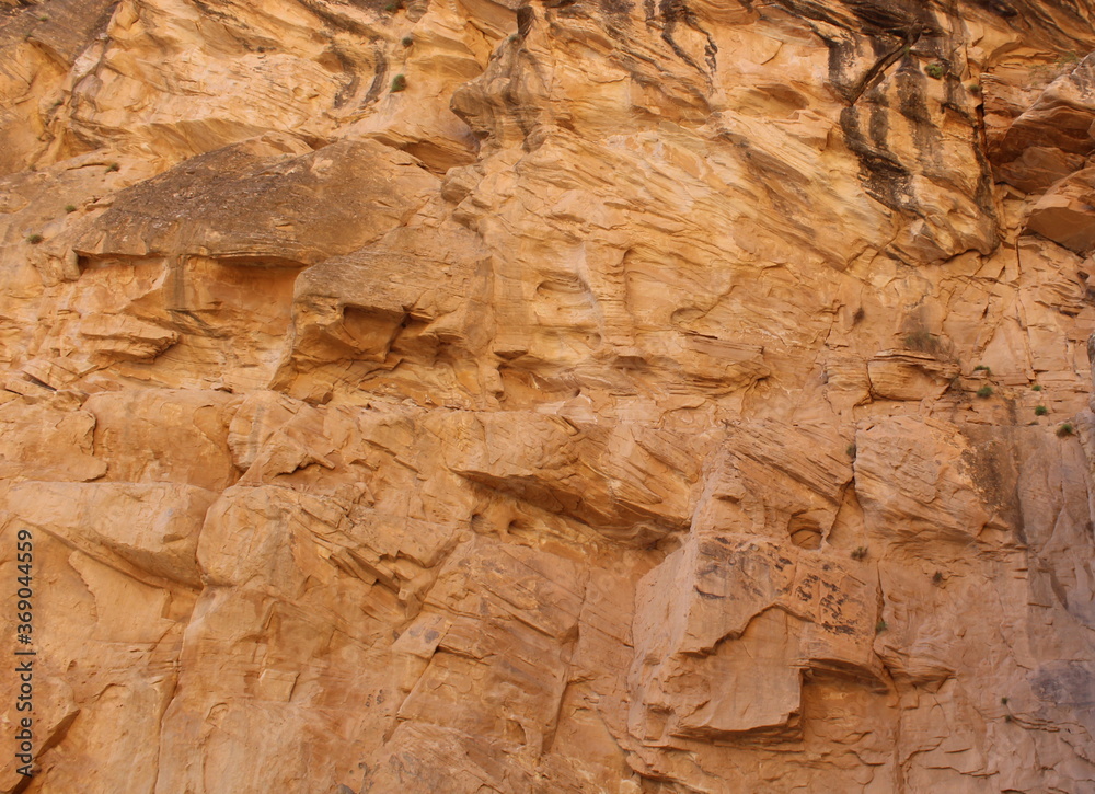 background texture of a sandstone rock wall