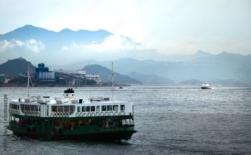 The boat is called star ferry. In hong kong, many people take it to travel between kowloon and hong kong island.