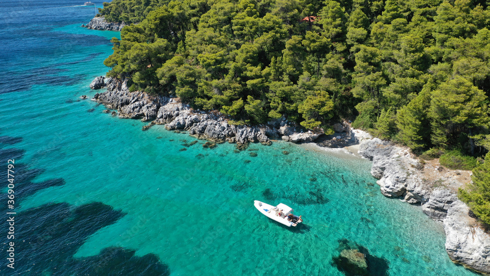 Aerial drone photo of breathtaking secluded turquoise beaches of Ftelia and Megalo Pefko in island of Skopelos, Sporades, Greece