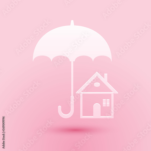 Paper cut House with umbrella icon isolated on pink background. Real estate insurance symbol. Protection, safety, security, protect, defense concept. Paper art style. Vector.