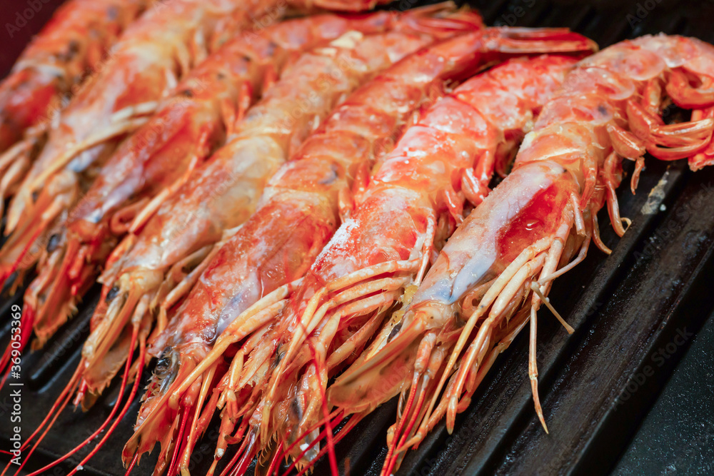 delicious fresh prawns lie on the grill, mediterranean seafood set