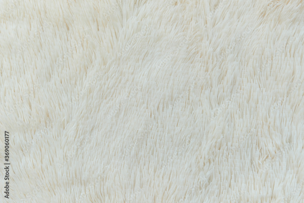 delicate soft background of plush fabric folds on white background. Copy space. Flat lay. loose folds on the fabric of faux fur of lilac color. Details of warm winter clothes delicate soft background of plush fabric folds on white background. Copy space. Flat lay. loose folds on the fabric of faux fur of lilac color. Details of warm winter clothes