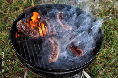 Barbecue sausages on the grill. BB background.