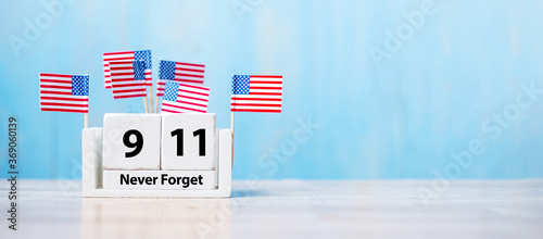 911 Never Forget with United States of America flag on wood background. copy space for text. Patriot Day and Memorial concept photo