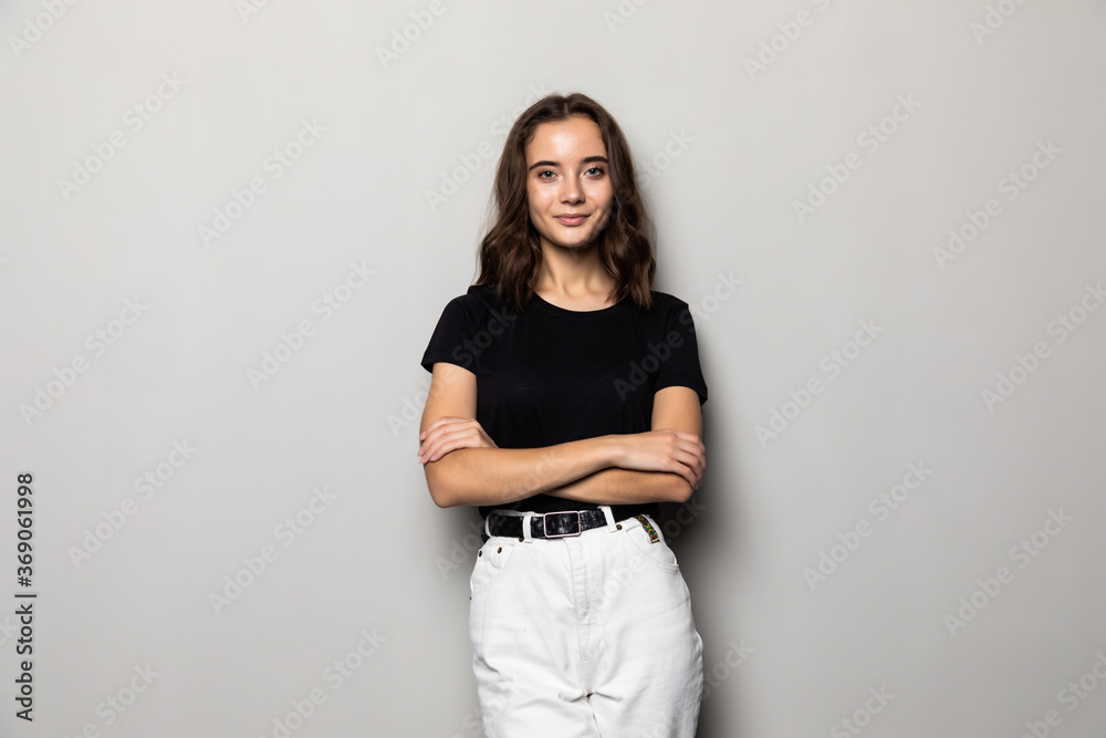 Portrait of beautiful brunette woman on grey background Portrait of beautiful brunette woman on grey background