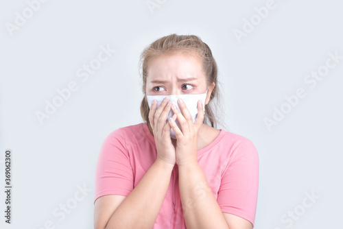Asian woman wearing hygienic mask to prevent infection corona virus.on white background