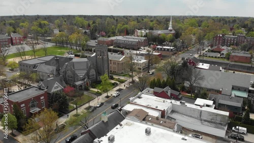 Aerial circle left shot over Haddonfield downtown with First Presbyterian Church photo