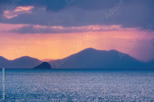 Abstract sunset with sea and tropical islands