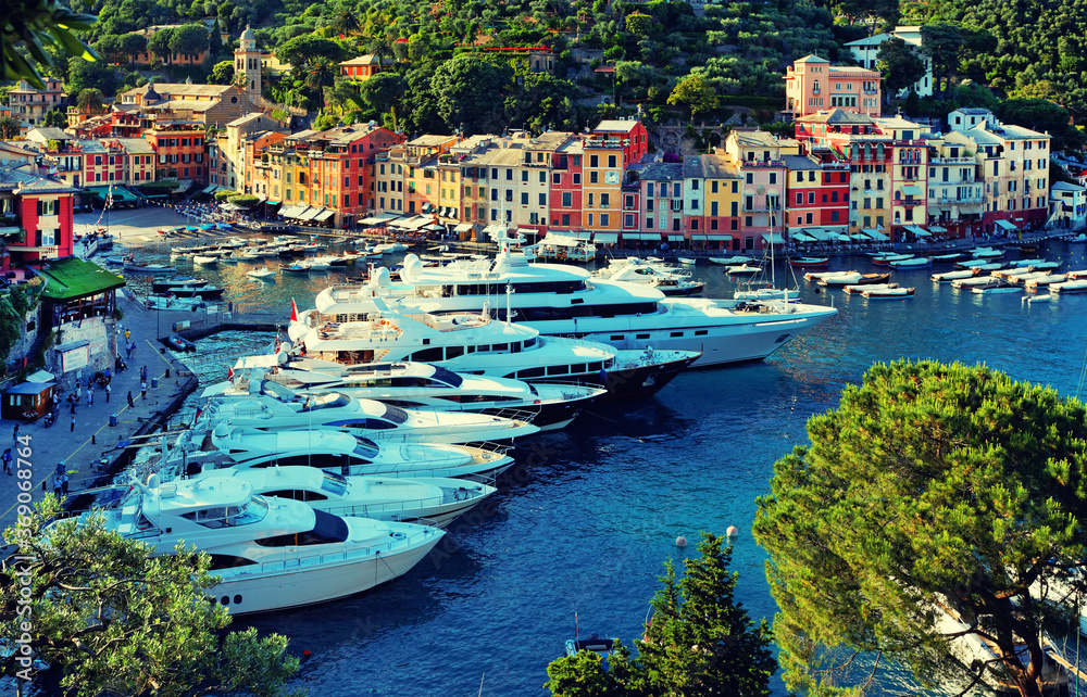 Portofino cityscape, best touristic Mediterranean place with typical colorful buildings and famous luxury harbor, Portofino, Liguria, Cinque Terre, Italy, Europe