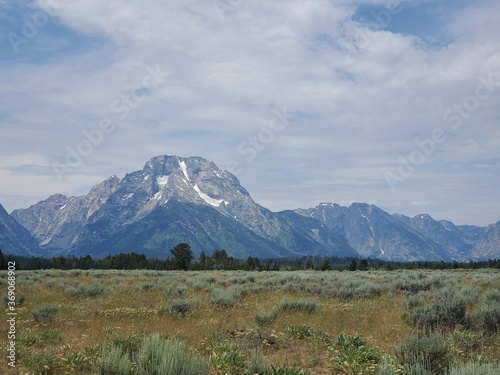 Tetons in the distance across the plains