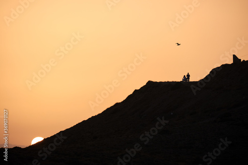 silhouette of a couple during the sunset in Cabo de Gata  Almeria