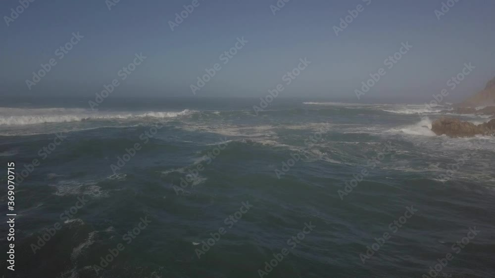 Confused sea state where Knysna River bar meets foggy Indian Ocean Confused sea state where Knysna River bar meets foggy Indian Ocean
