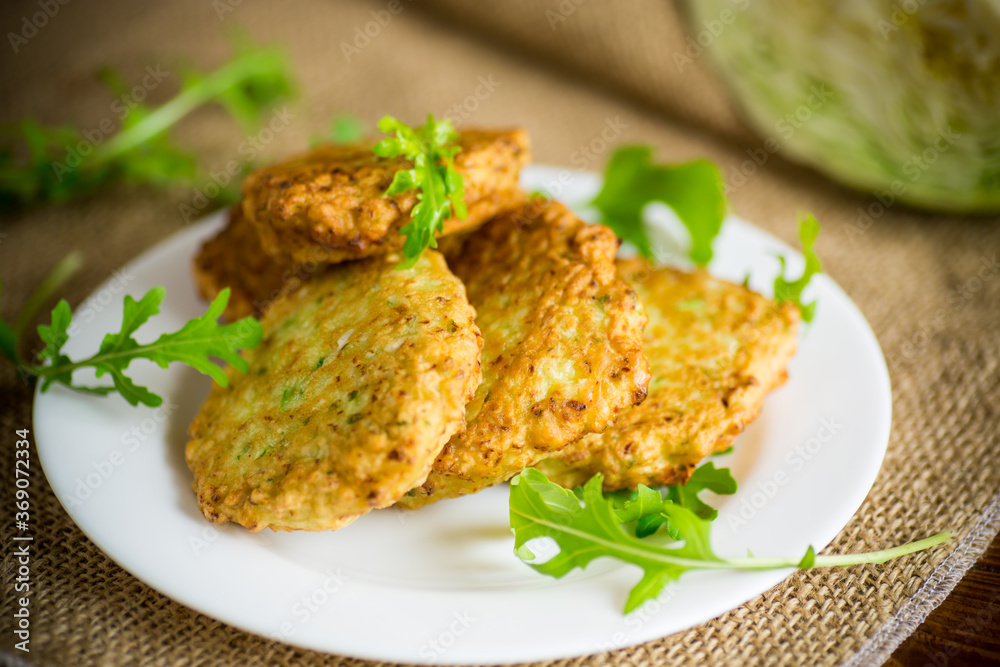 vegetable vegetarian fried cabbage pancakes in a plate vegetable vegetarian fried cabbage pancakes in a plate