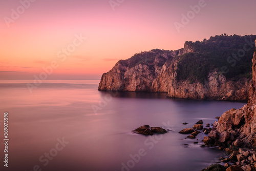 Beautiful sunrise at the Mediterranean Sea (the coastline of Costa Brava, Begur, Catalonia, Spain)