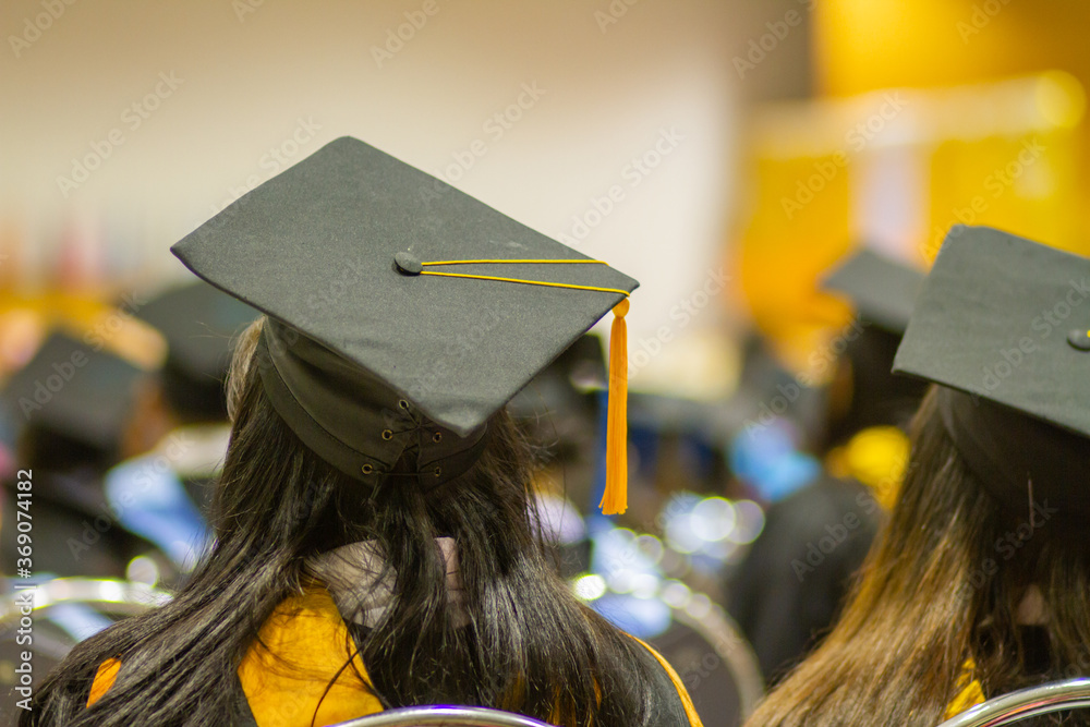 The image of a graduation hat from the back of a successful university ...
