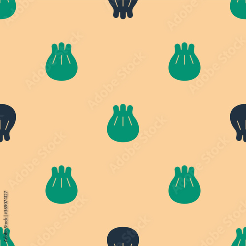 Green and black Khinkali on cutting board icon isolated seamless pattern on beige background. Traditional georgian dumpling. Vector Illustration.