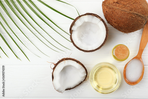 coconut oil and coconuts on the table

