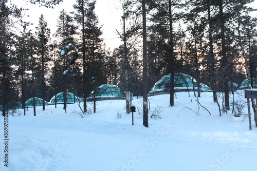Glass igloo in sunrise in Lapland, Finland, Kakslauttanen, Rovianemi. 