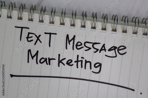 Text Message Marketing write on a book isolated wooden table.