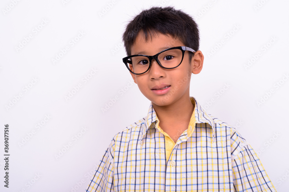 Portrait of cute Asian boy with eyeglasses as student Portrait of cute Asian boy with eyeglasses as student