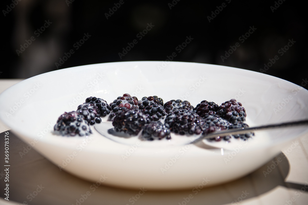 blackberries in a white bowl