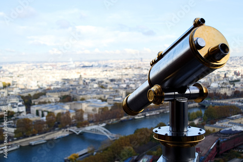 view from the Eiffel Tower with a telescope in the foreground